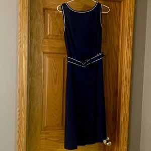 Women’s Navy dress with white stitch detail.  Size 4